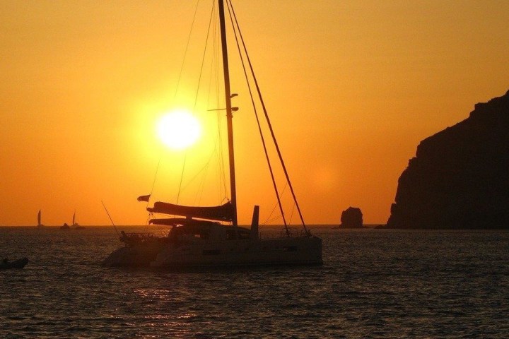a small boat in a large body of water