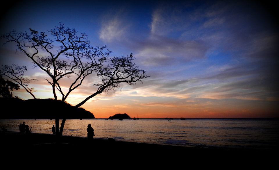 a sunset over a body of water