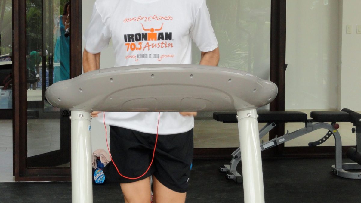 a man standing in front of a window