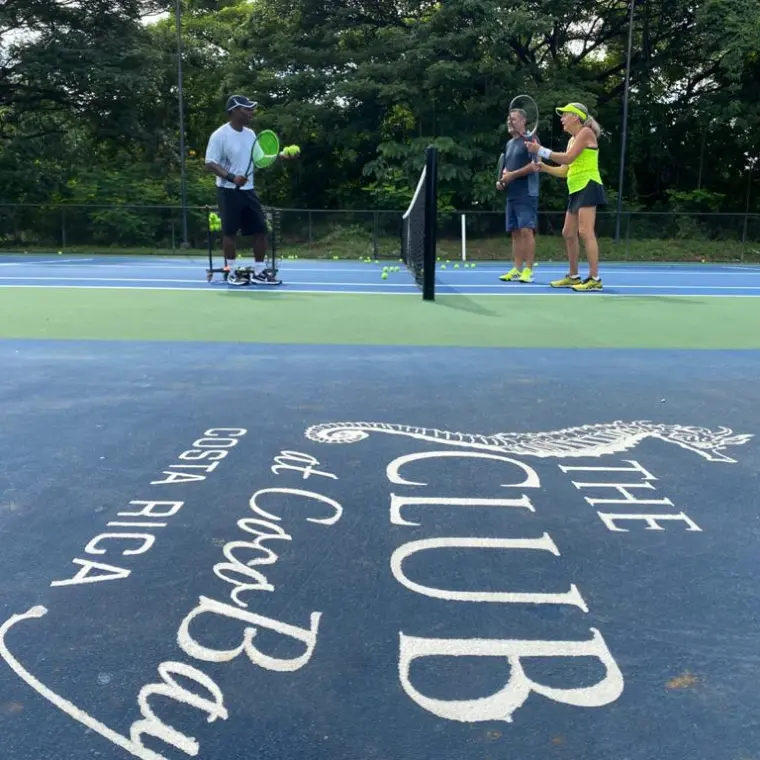 a group of people walking down the street