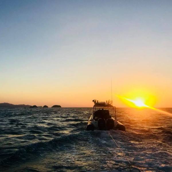 a sunset over a body of water