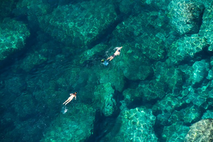 underwater view of a large rock